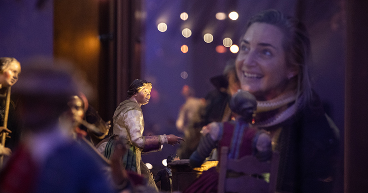 woman looking at Christmas display at The Auckland Project, Bishop Auckland